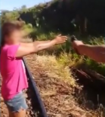 Woman takes Bullet through Both Hands as Punishment 