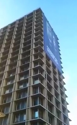 Woman Commits Suicide from Tall Building in Front of Screaming Onlookers 