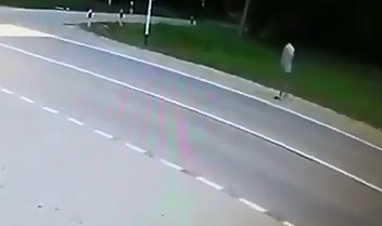 WOW...Watch the m an trying to Cross the Street 