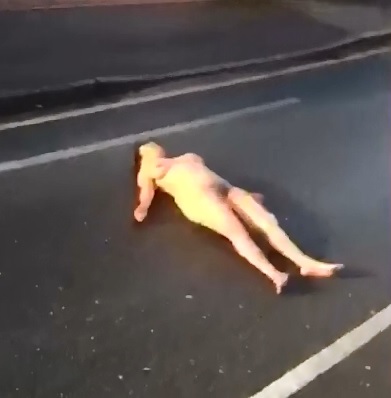Naked Woman in the Street....Lies Down Perfectly 