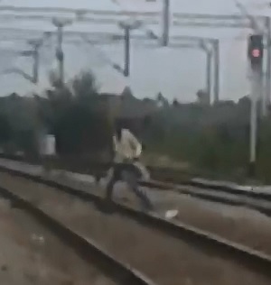 Moron Plays Chicken with a Train and Loses his Life 