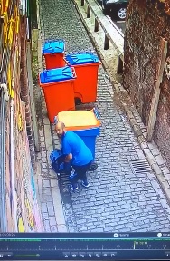 Idiot Employee Shits right in the Street as he takes out the Garbage 