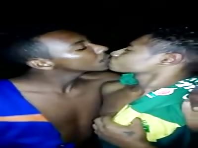 Thugs Forced by Police to Kiss