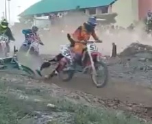 Weird Accident Shows Guy Tangled in Wheel Competing Motorcycle