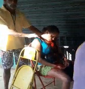 Woman Still Agonizing Sitting in a chair Slowly Dies