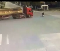 Rider Escapes First Then Ends up Crushed by Truck