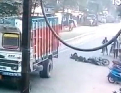 Biker and Passenger Being Crushed by Truck....OUCH!