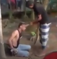 Thief Tied to a Tree is Punished in Public