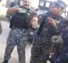 Celebrating Passing the Head of Your ISIS Enemy Around 