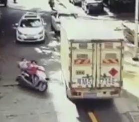 Two Little Kids Riding a Motorcycle Collide with Truck