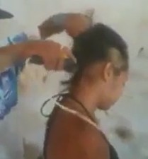 LOL: Girl having her head shaved by thug for talking too much