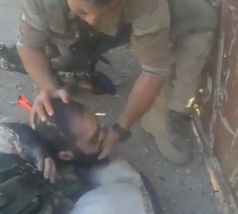 Soldier Cuts and Twist up Daesh's Head