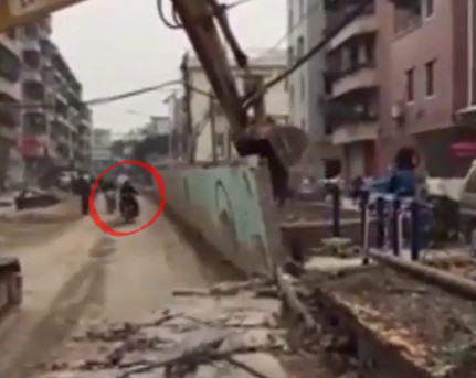 Shocking Moment Digger Pulls Down Wall and Flattens Man