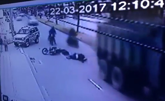 Rider falls and is crushed by truck 