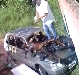 Burned Man Being Removed from His Car