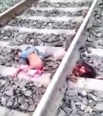 Woman Dead and her Child Ripped Apart by Train