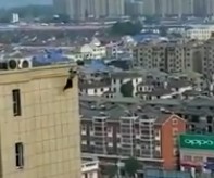 Chinese girl jumps to her death from building (2 camera angles)