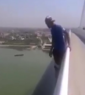 Kid in Blue Shirt Jumps to His Death From Bridge