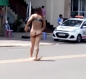 Absolute Crazy Drugged up Chick in the Middle of the Road