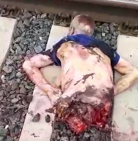 Man Perfectly Severed in Half (Suicide, Russia)