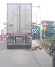 Live Suicide Under Truck Wheel