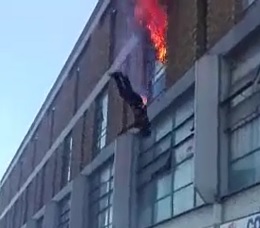2  NEW ANGLES Woman Jumping from a Burning Building 