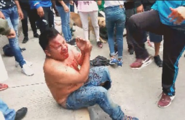 Dude is Beaten Bloody in Brutal Street Punishment