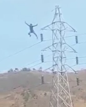 Crazy Man Jumps Off Power Transmission Tower in Hohola
