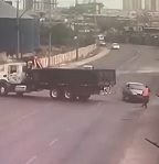 Guy Trying to Speed Around Truck Strikes Worker