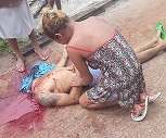 Crime Scene with Victim Beheaded and Crying Girlfriend