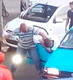 Big Guy Beats the Shit out of Kid that Hit his Car at Gas Station
