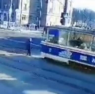 Oblivious Woman Doesn't Notice Tram
