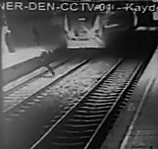 Guy Jumps in Front of Train... Ouch