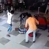 Dude Beaten with Pipes and Bats in Busy Store