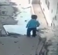 Little Kid Falls in a Huge Pothole Puddle