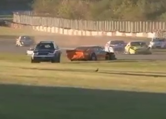 Out-of-Control Racecar Drives Fast into Auxiliary 