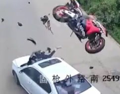 Biker and Windshield Become One
