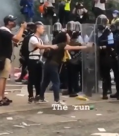Loud Female Protester Shot in the Face