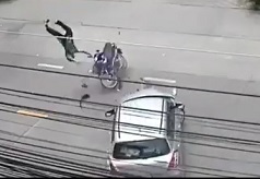 Biker Clipped by Turning Car Turned into Ragdoll