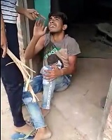 Crying Dude Beaten with Bamboo