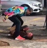 Thug in Colorful Shirt Almost Beats Man to Death for Stealing 