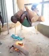 Nigerian Soldiers Literally Roast Torture a Civilian 