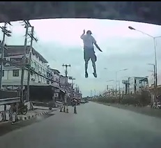 Jumper Lands Right In Front of Car