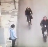 Psycho Woman Stabs Random Man on a Bike