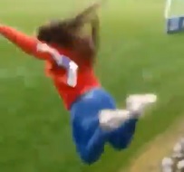 Moronic Girl Jumps Out of Stands During Soccer Game