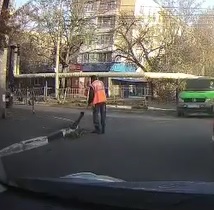Workers Last Time Sweeping the Road