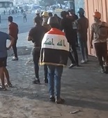 Dude Wearing Flag Gets Bullet to the Head