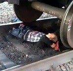 Dude Squirming Under Train with his Legs Gone