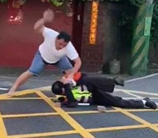 DAMN: Dude Attacks Traffic Worker with a Brick to the Head.