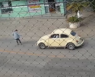 Little Yellow VW Beetle Comes Out of Nowhere to Ragdoll Bitch